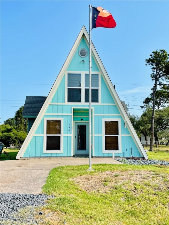 a front view of a house with garage