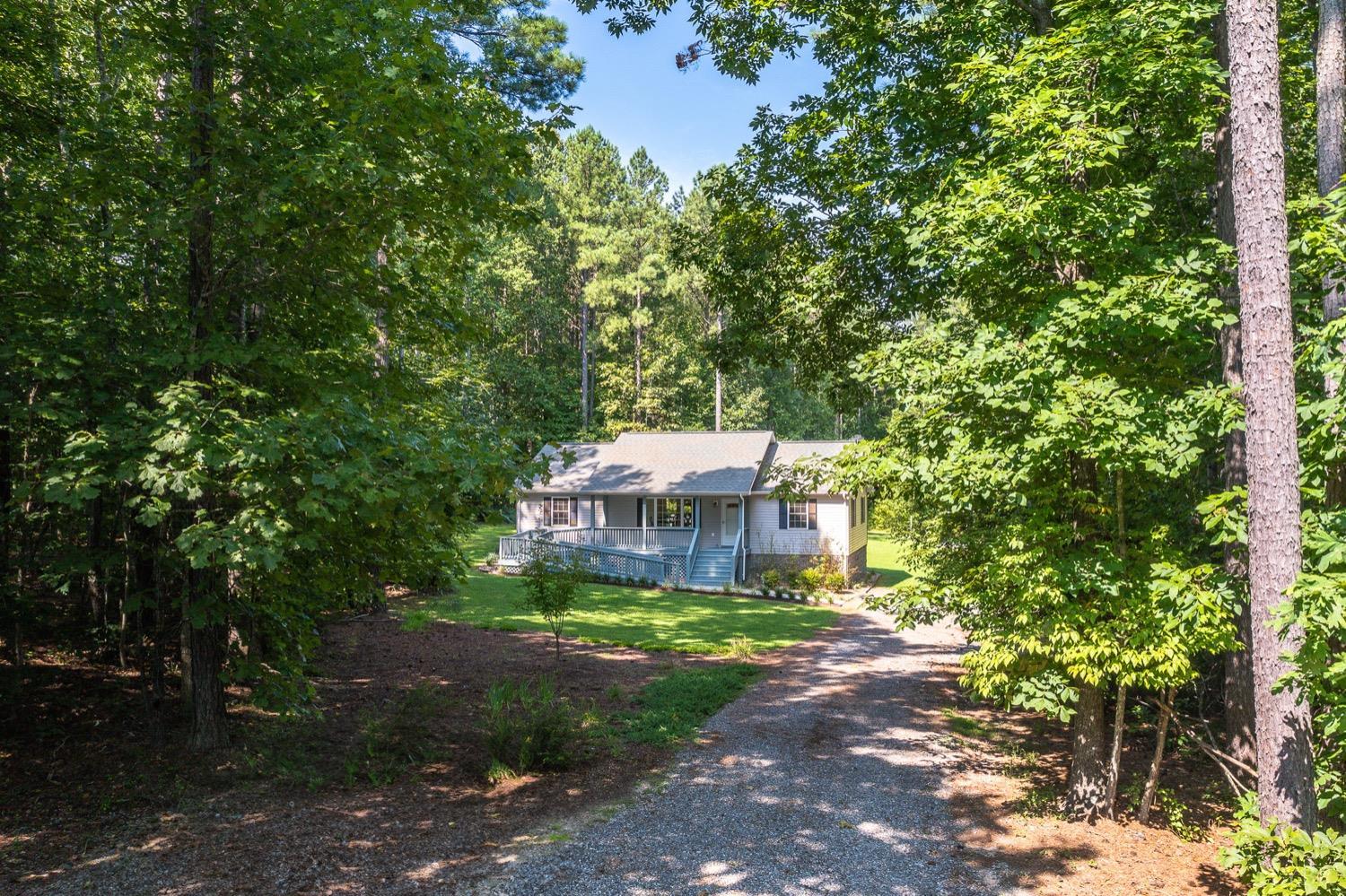 a view of a back yard of the house