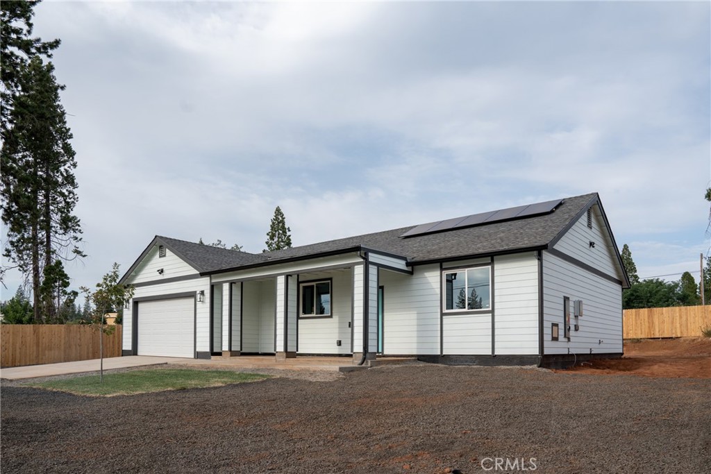 a front view of a house with a garage