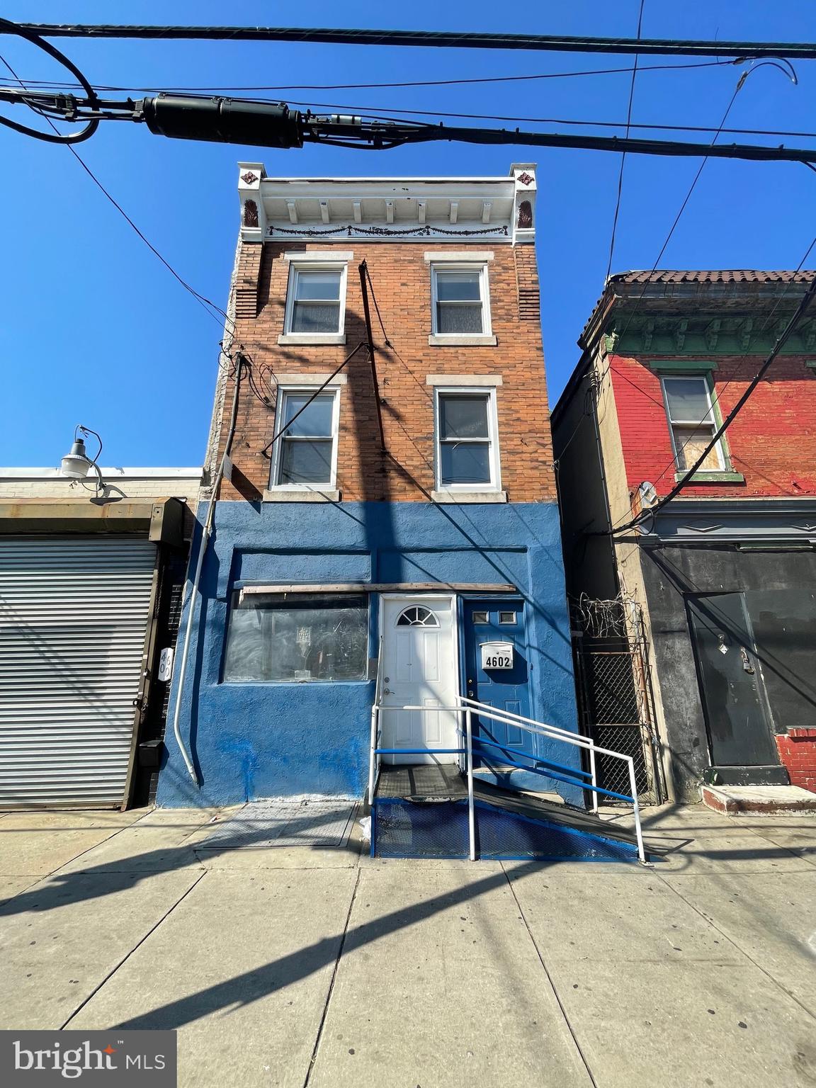 a front view of a house with parking