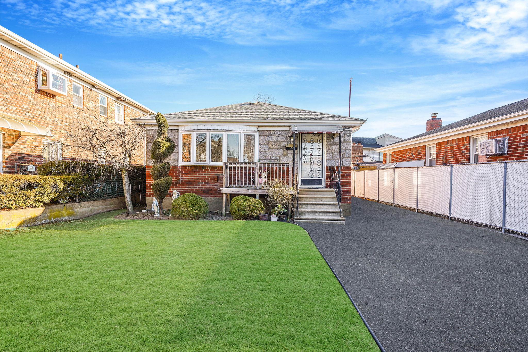 View of front of house with a front lawn