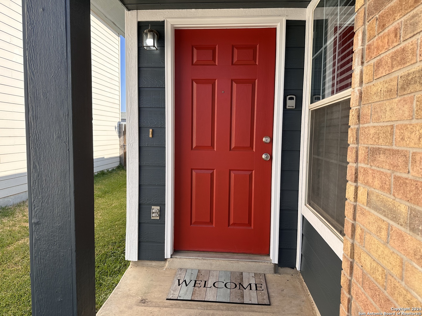 a view of a red door of the house