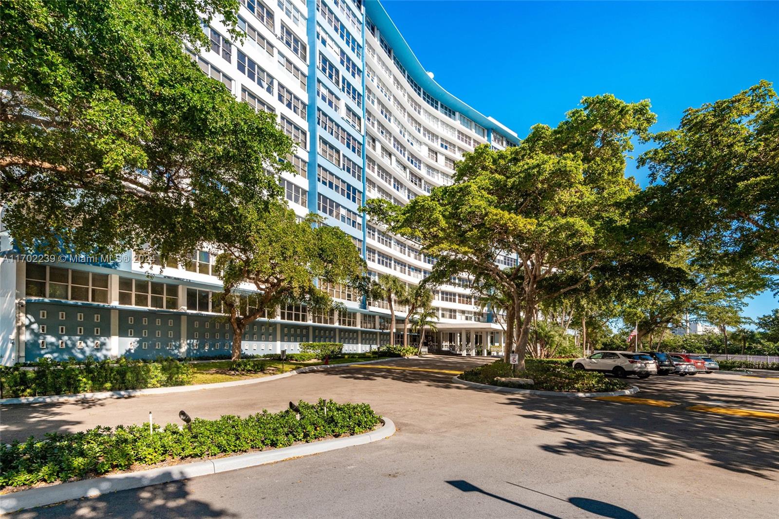 a building with trees in front of it