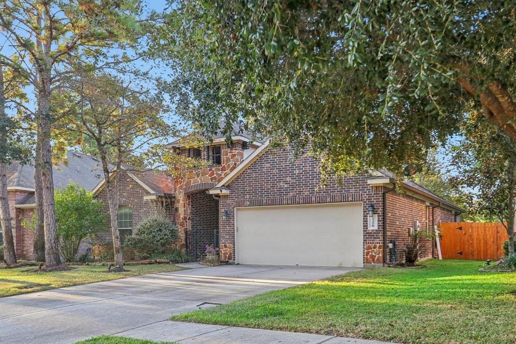 a house that has a tree in front of it