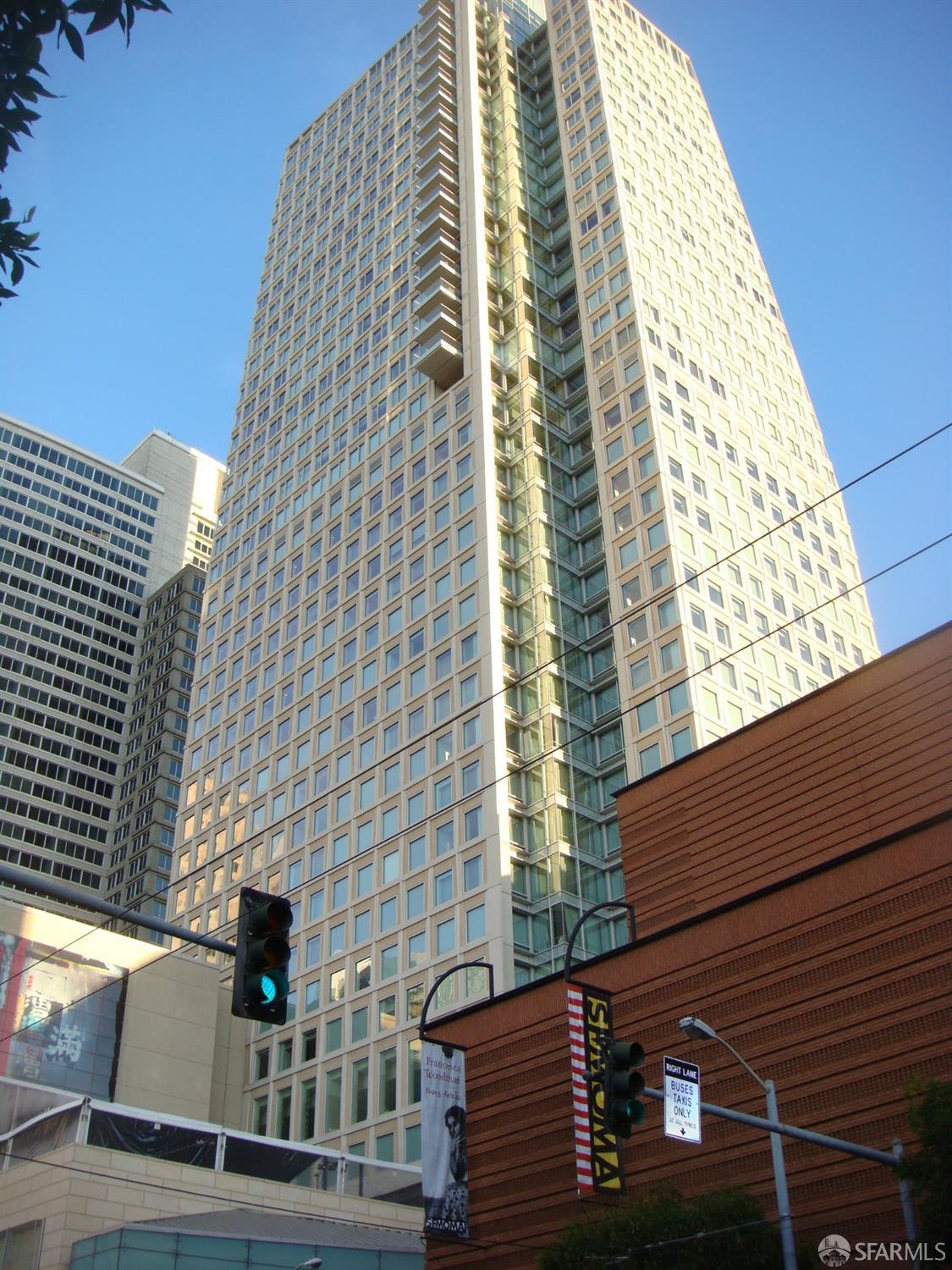 a view of a building with a street