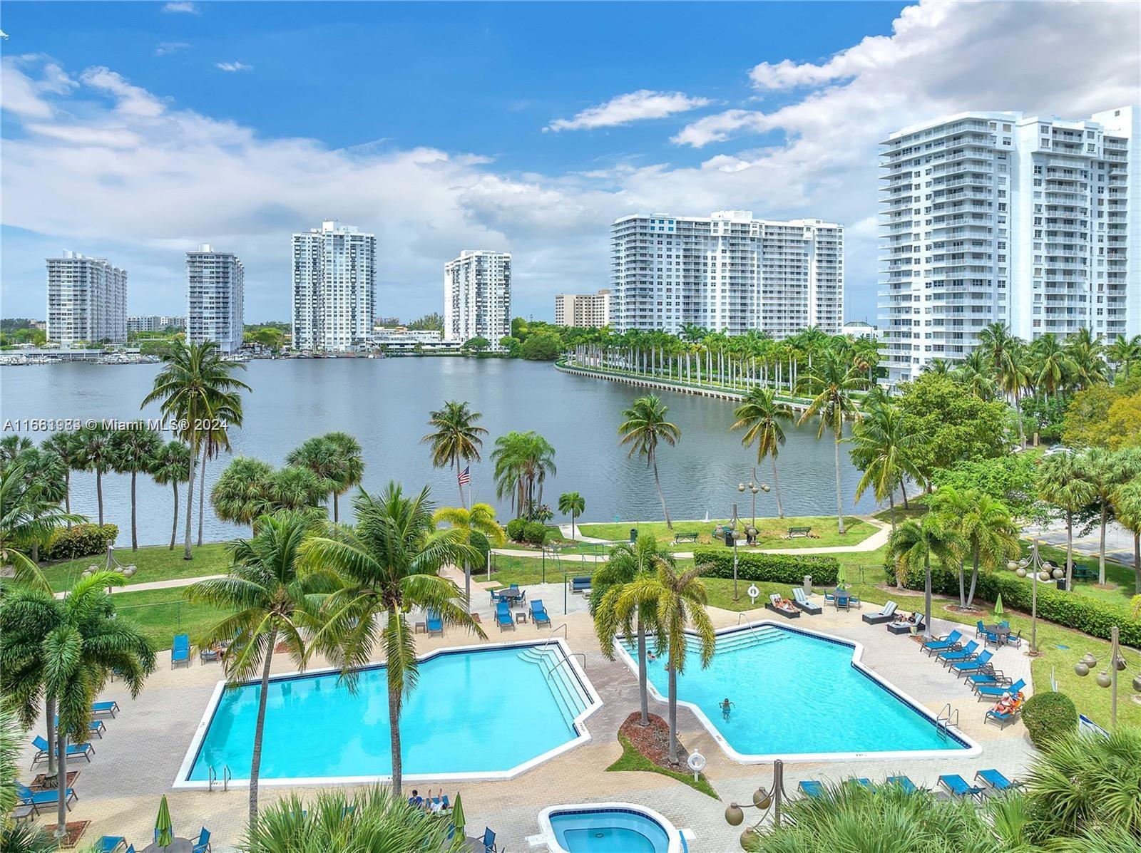 a view of a city with tall buildings