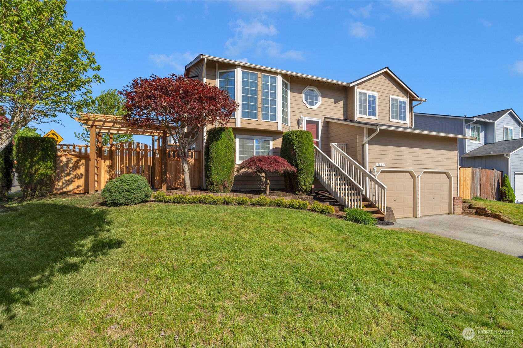 a view of a house with a yard