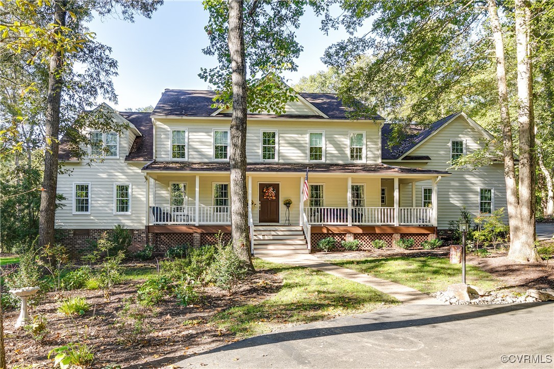 a front view of a house with a porch