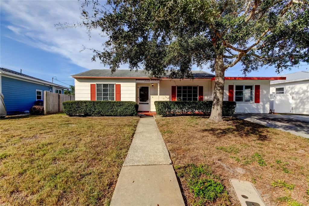 front view of a house with a patio