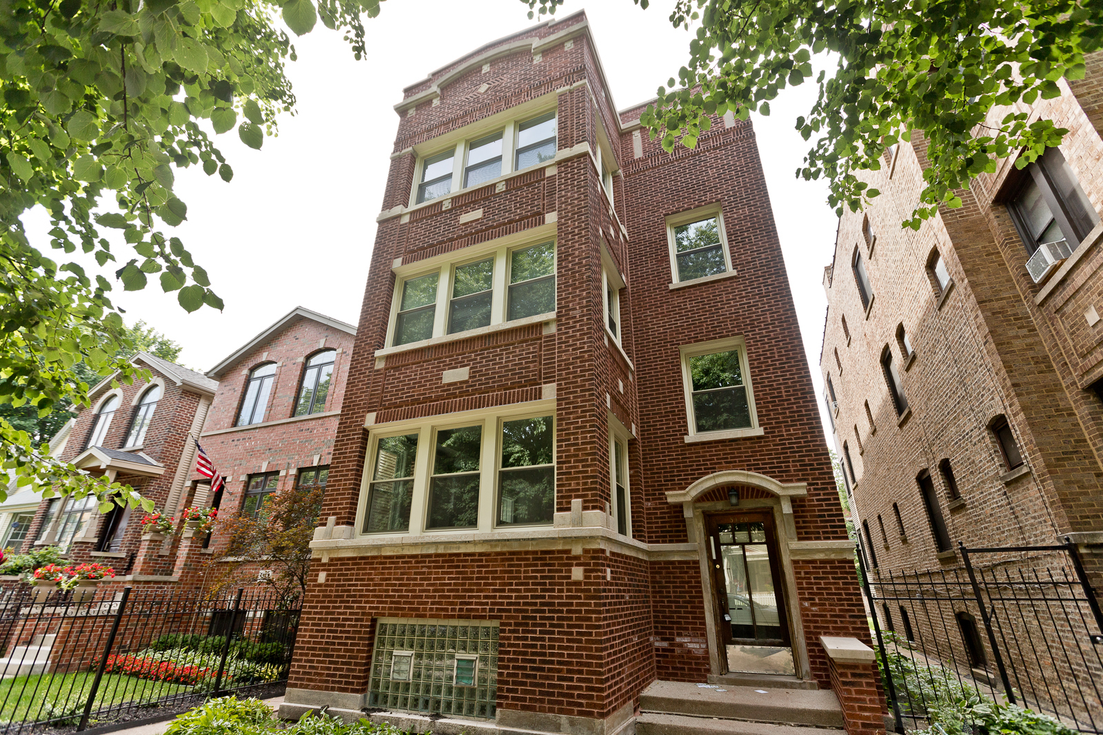 a front view of a multi story residential apartment building