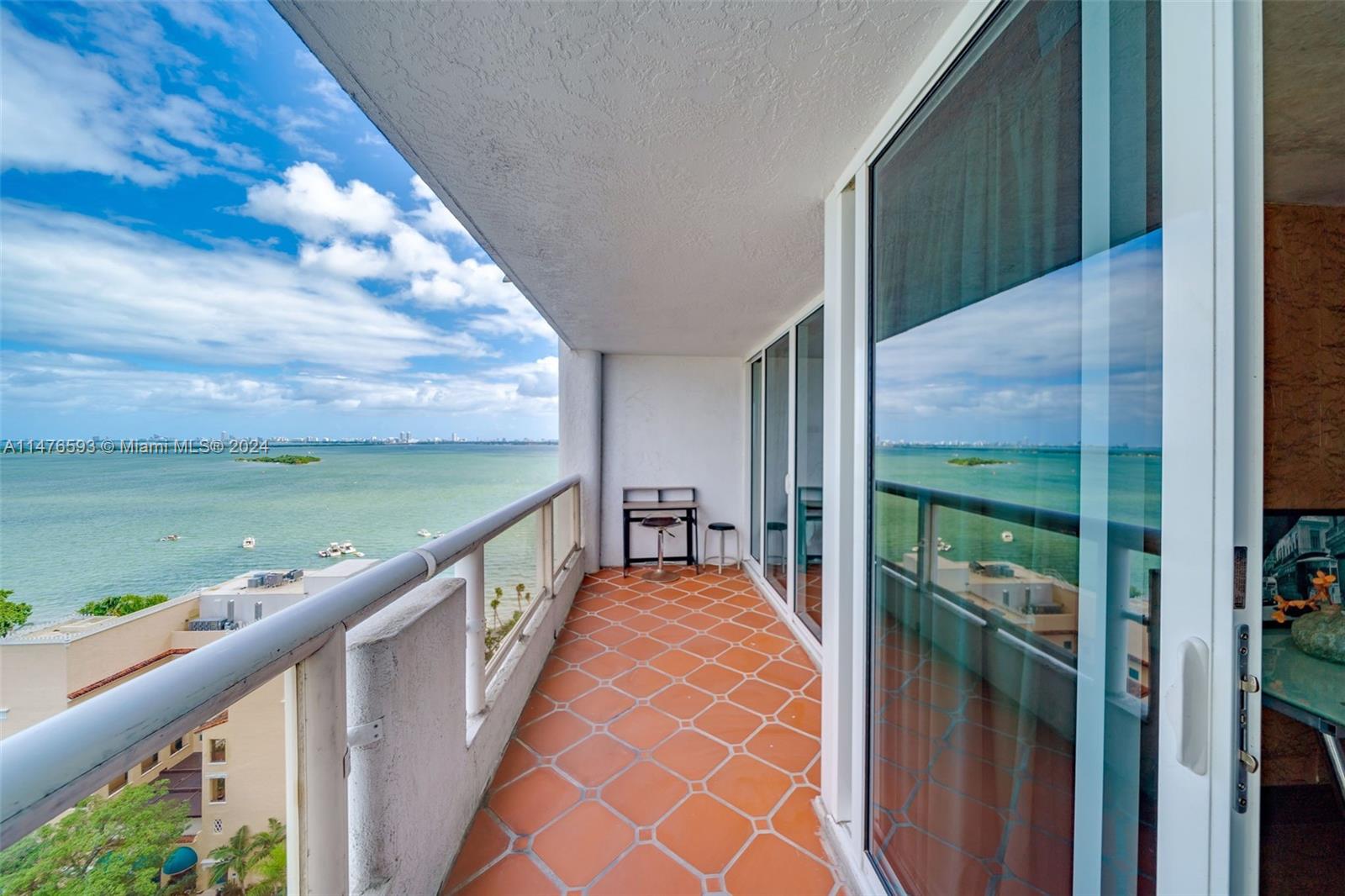 a view of balcony with yard