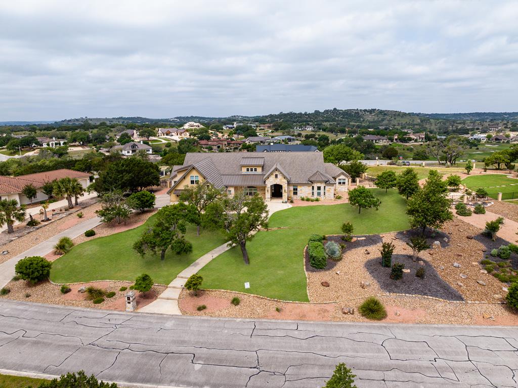 an aerial view of a house with a garden