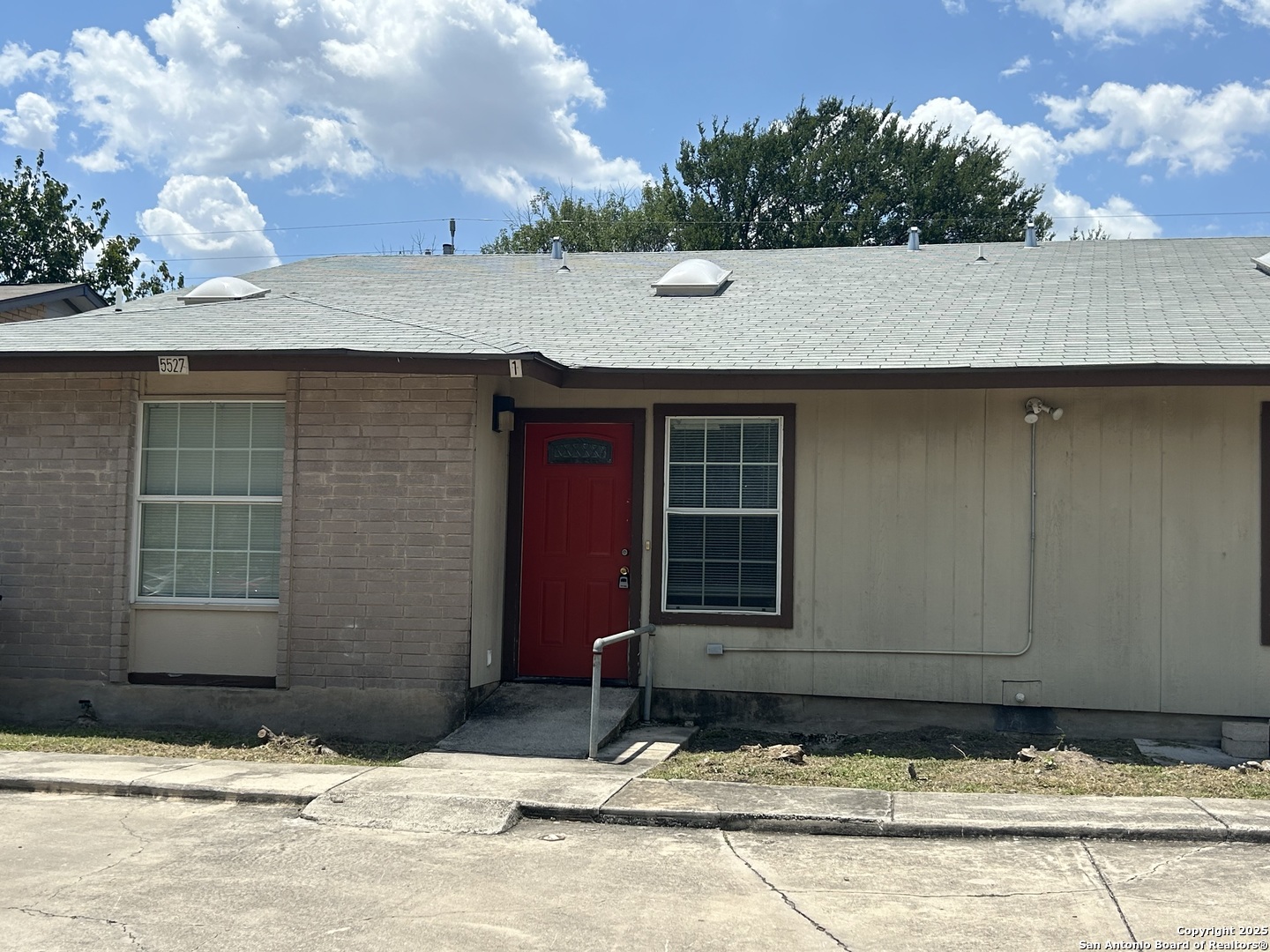 a view of house with outdoor space