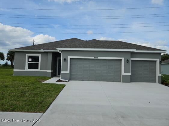 front view of house with a yard