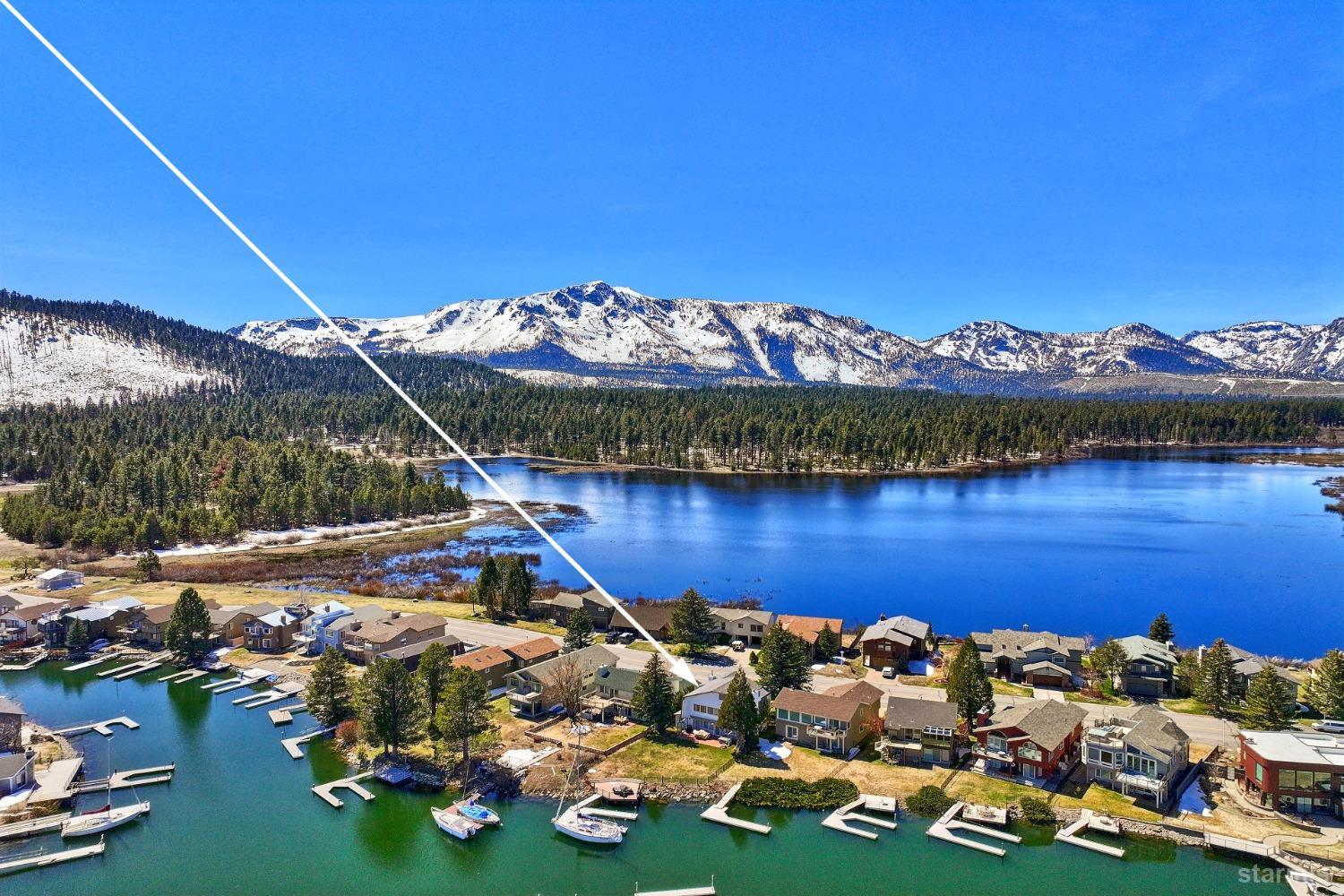 a picture of a lake with a mountain