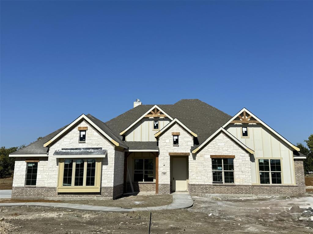 a front view of a house with yard