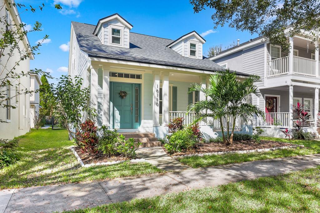 front view of a house with a yard