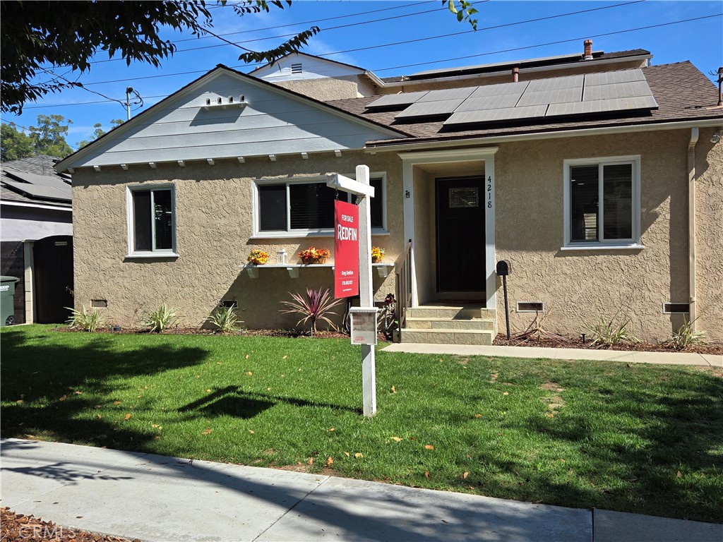 front view of house with a yard