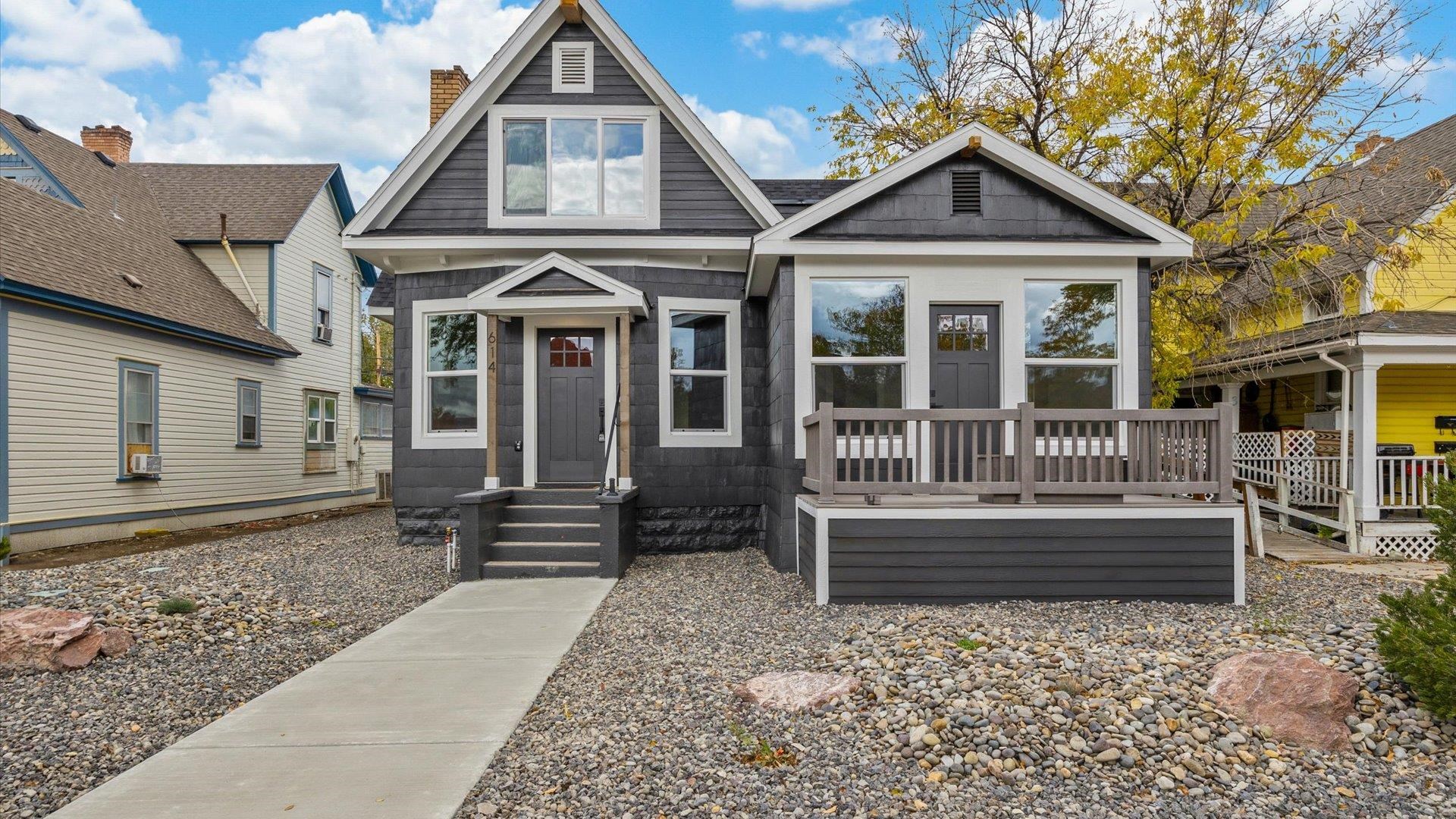 a front view of a house with a porch