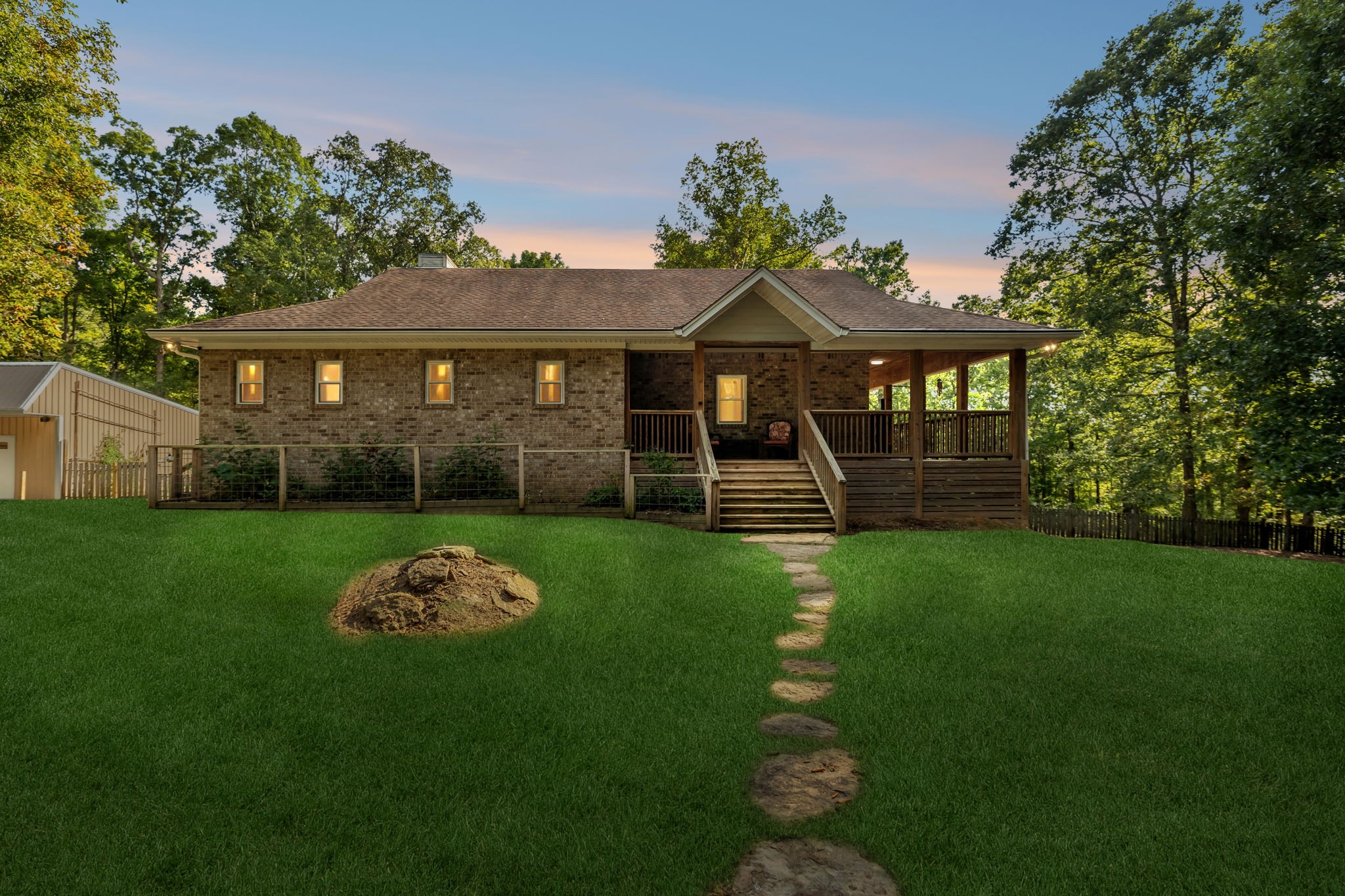 This passive solar house faces north so the smaller north facing windows which for provides natural light in the home while minimizing heat loss.  The exterior is constructed of insulated concrete forms and is 11 inches of foam and concrete.