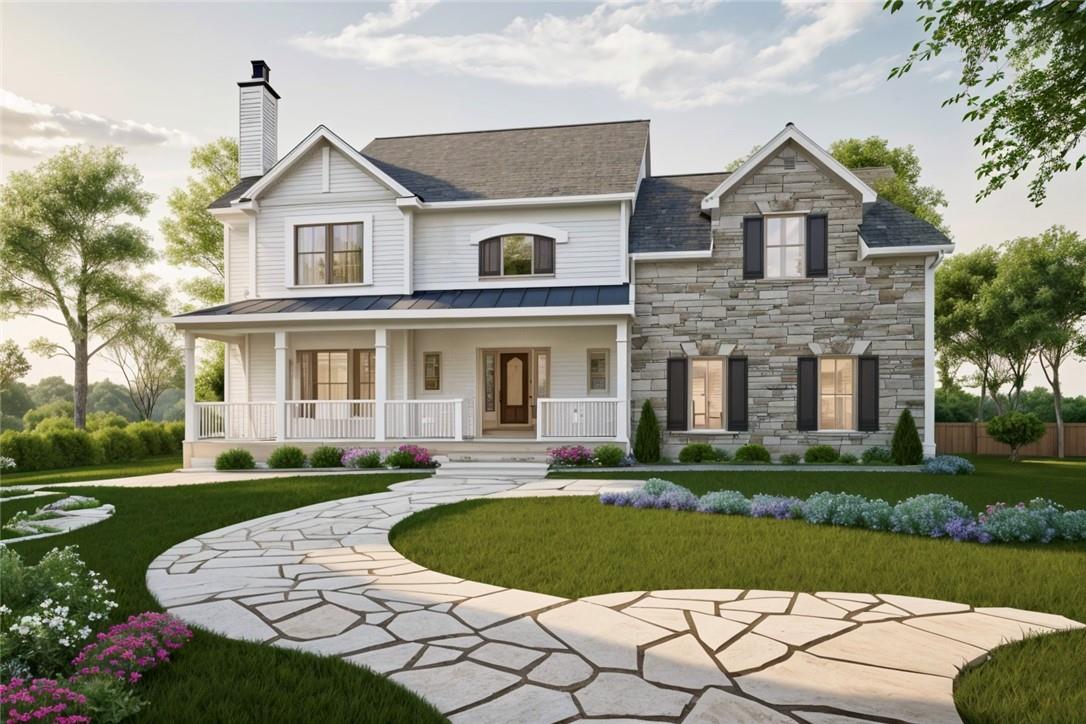 View of front of property with a front yard and covered porch