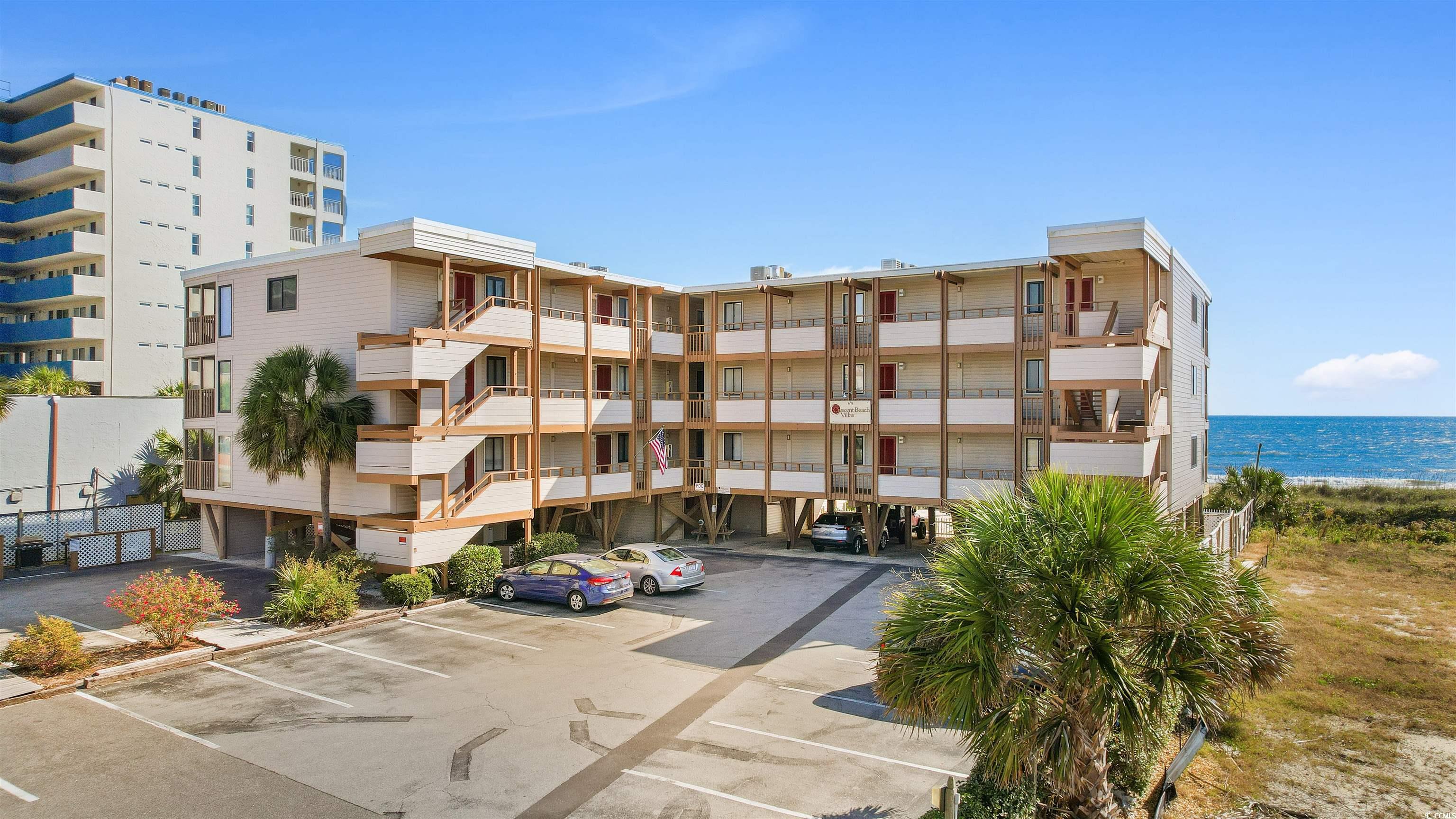 View of building exterior with a water view