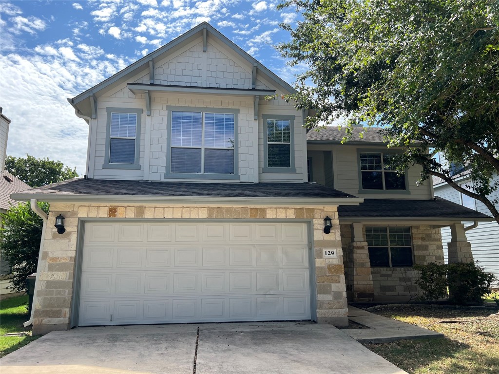 a view of house with outdoor space