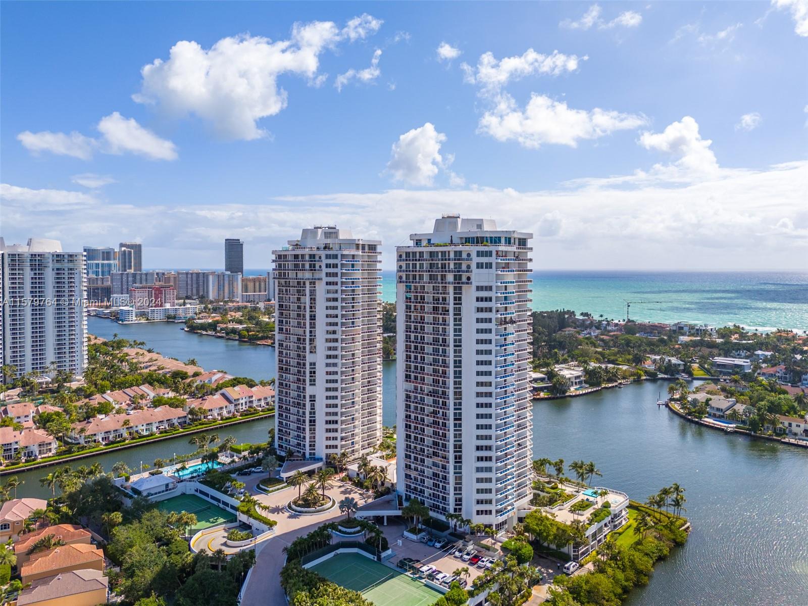 a view of a city with tall buildings