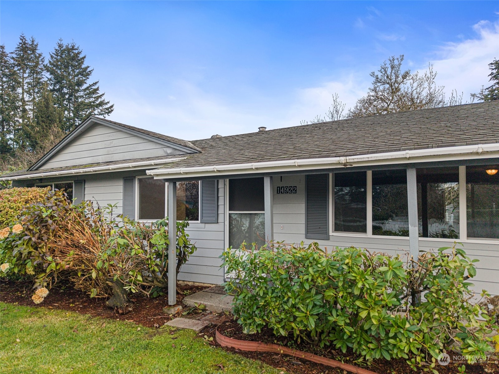 front view of a house with a small yard