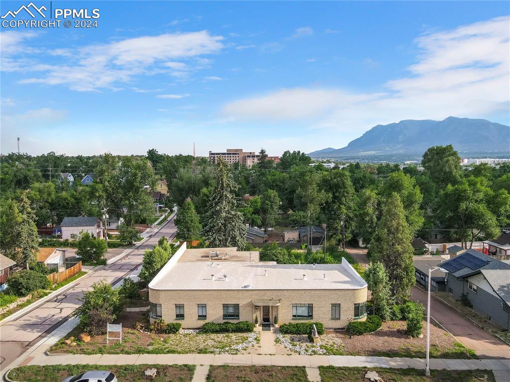 a view of a big yard with houses