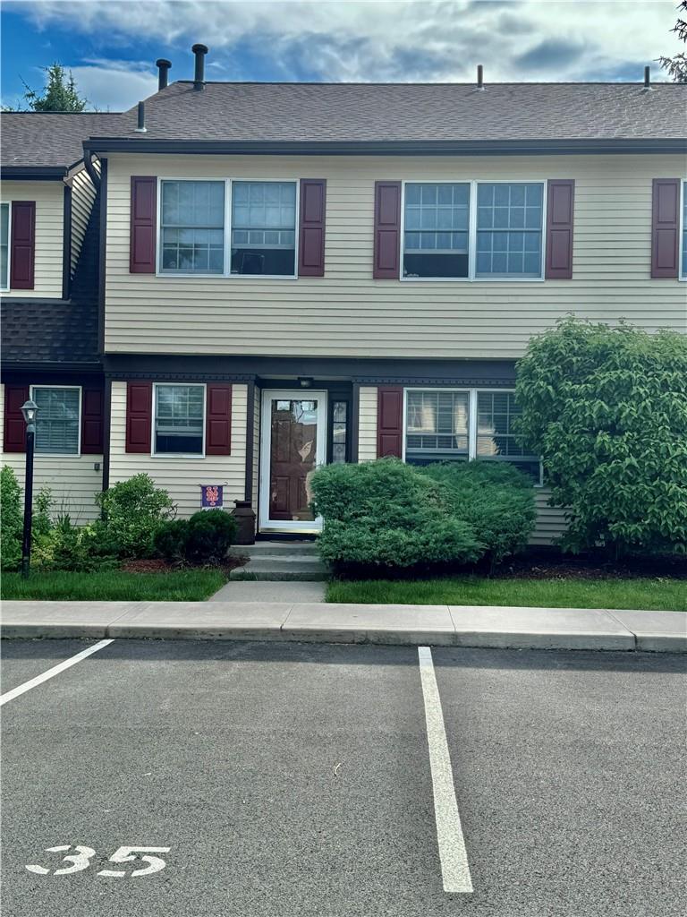 a front view of house with yard