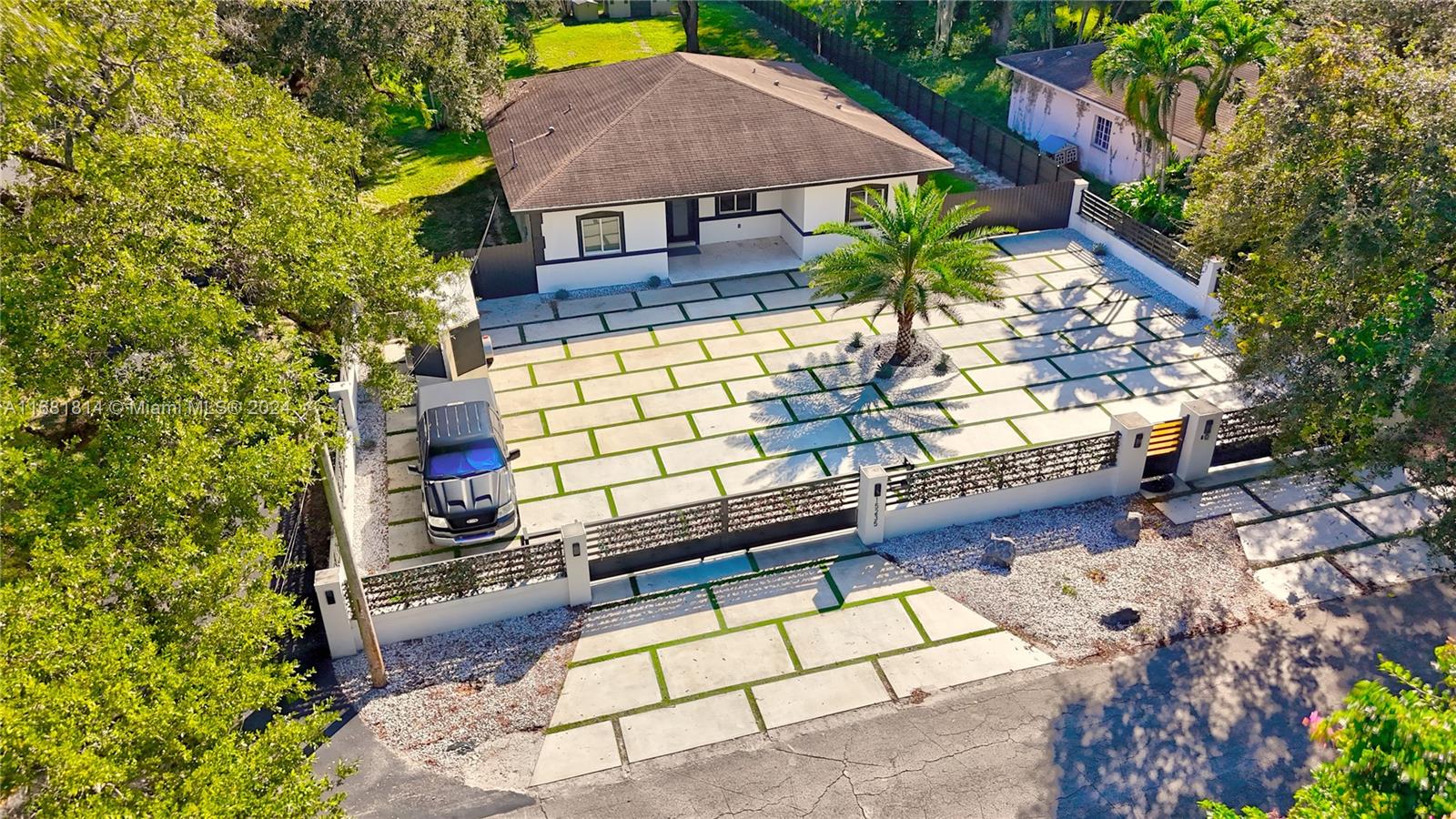 a view of house with outdoor space and sitting area