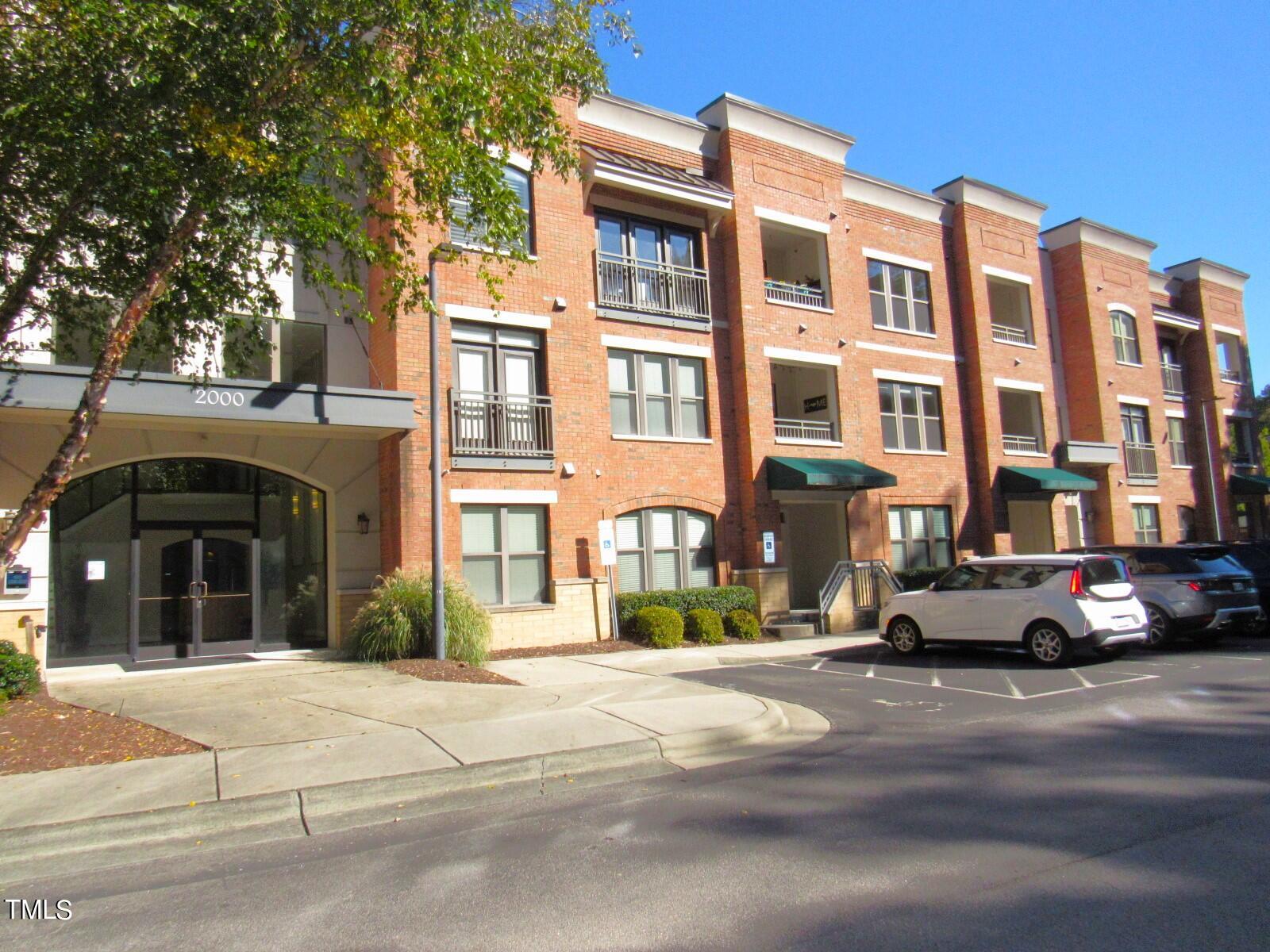 a view of a building and a street