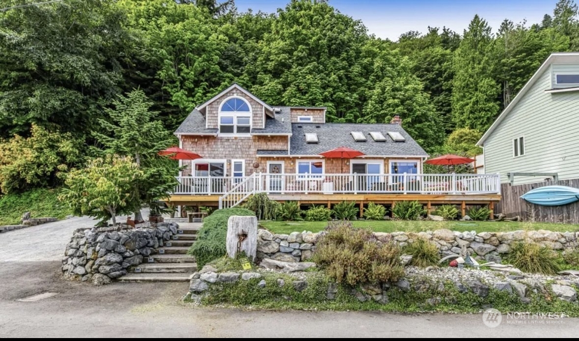 a aerial view of a house with a yard