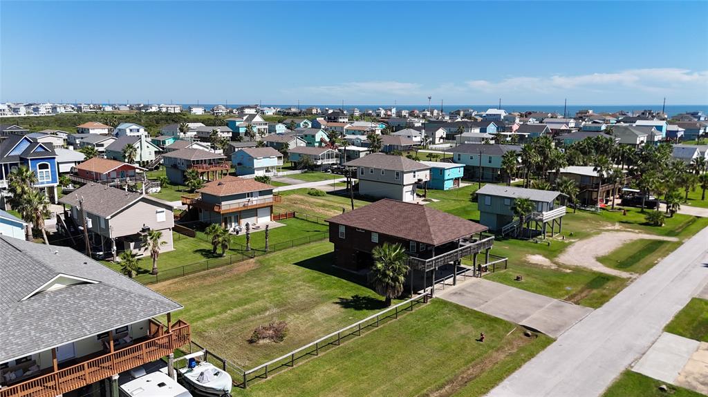 an aerial view of a house with a garden