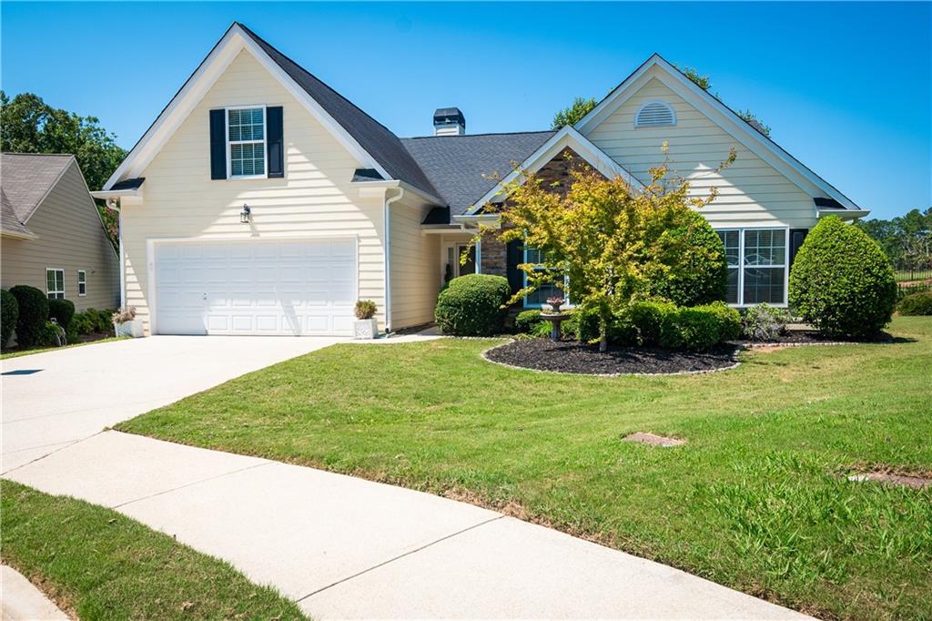 a front view of house with yard