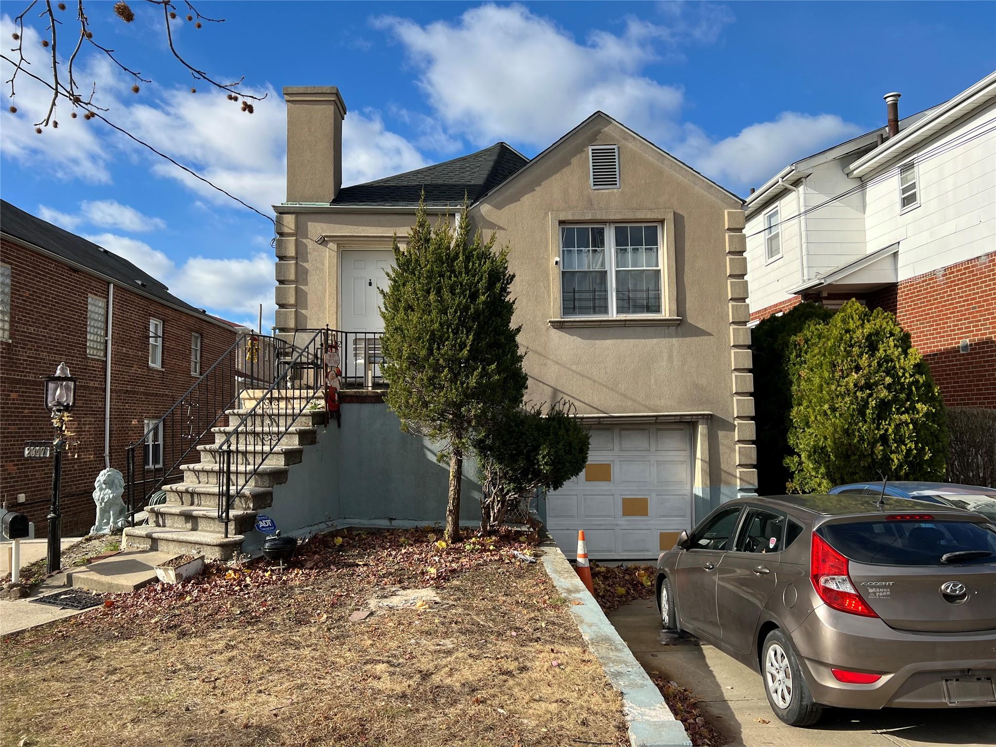 View of front facade with a garage