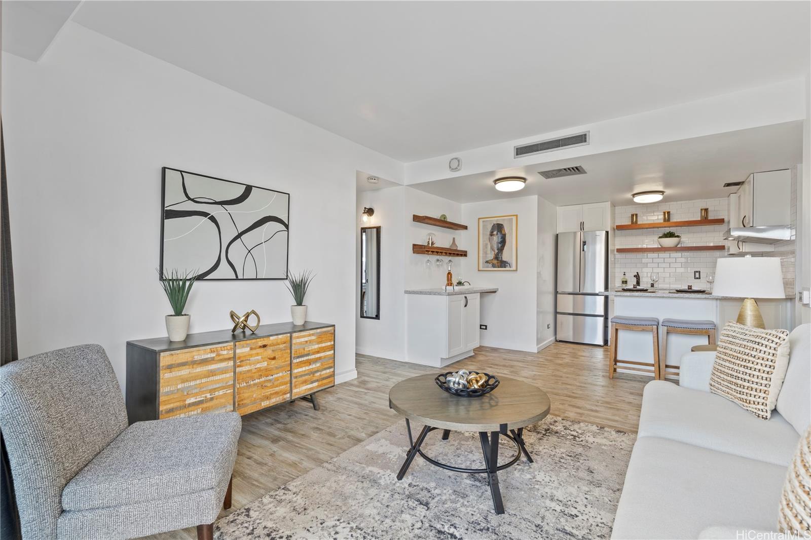 a living room with furniture and rug