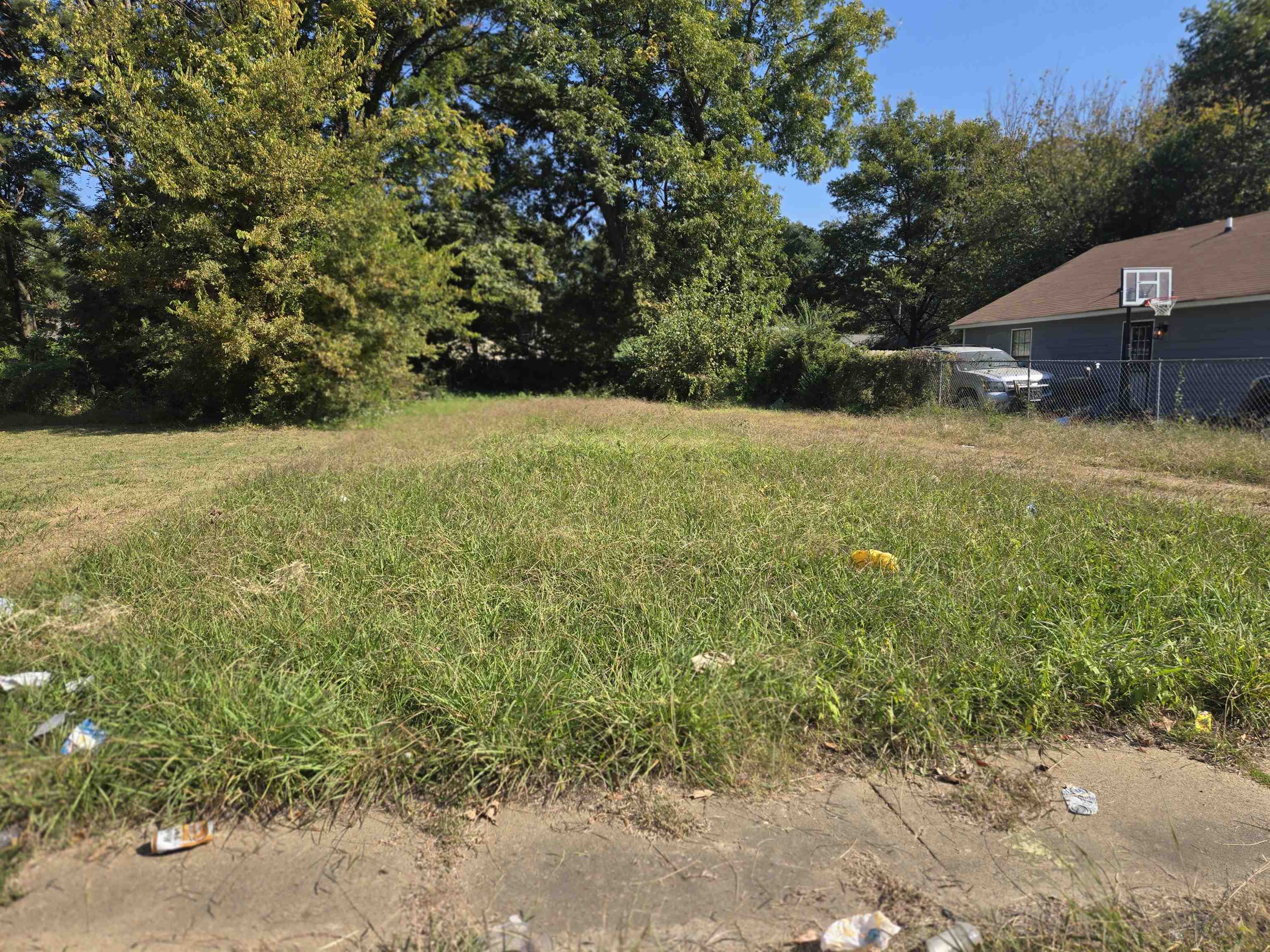 a view of a yard with an outdoor space