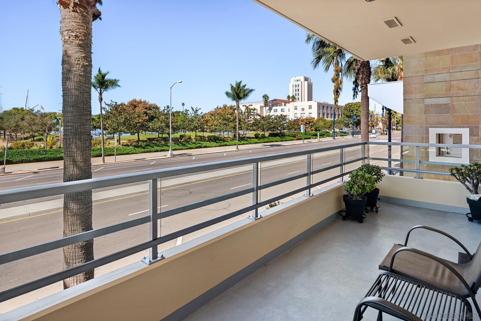 a view of balcony with furniture