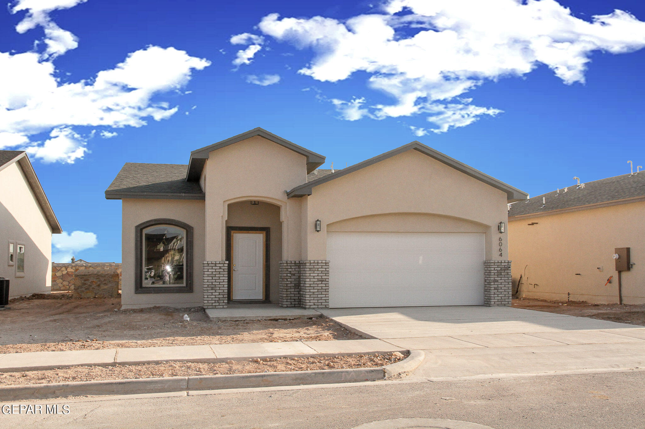 a view of a house with a garage