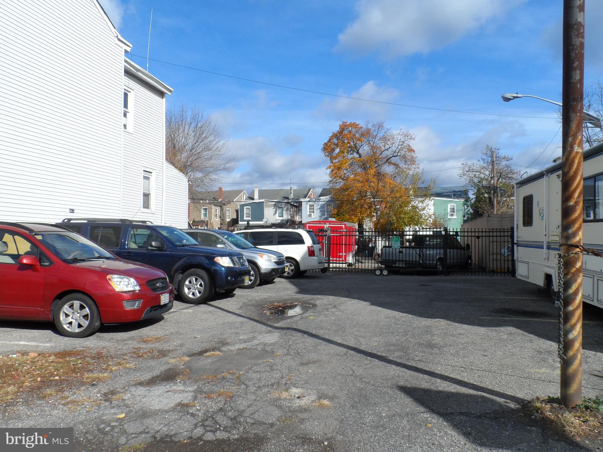 a view of a cars parked in front of a building