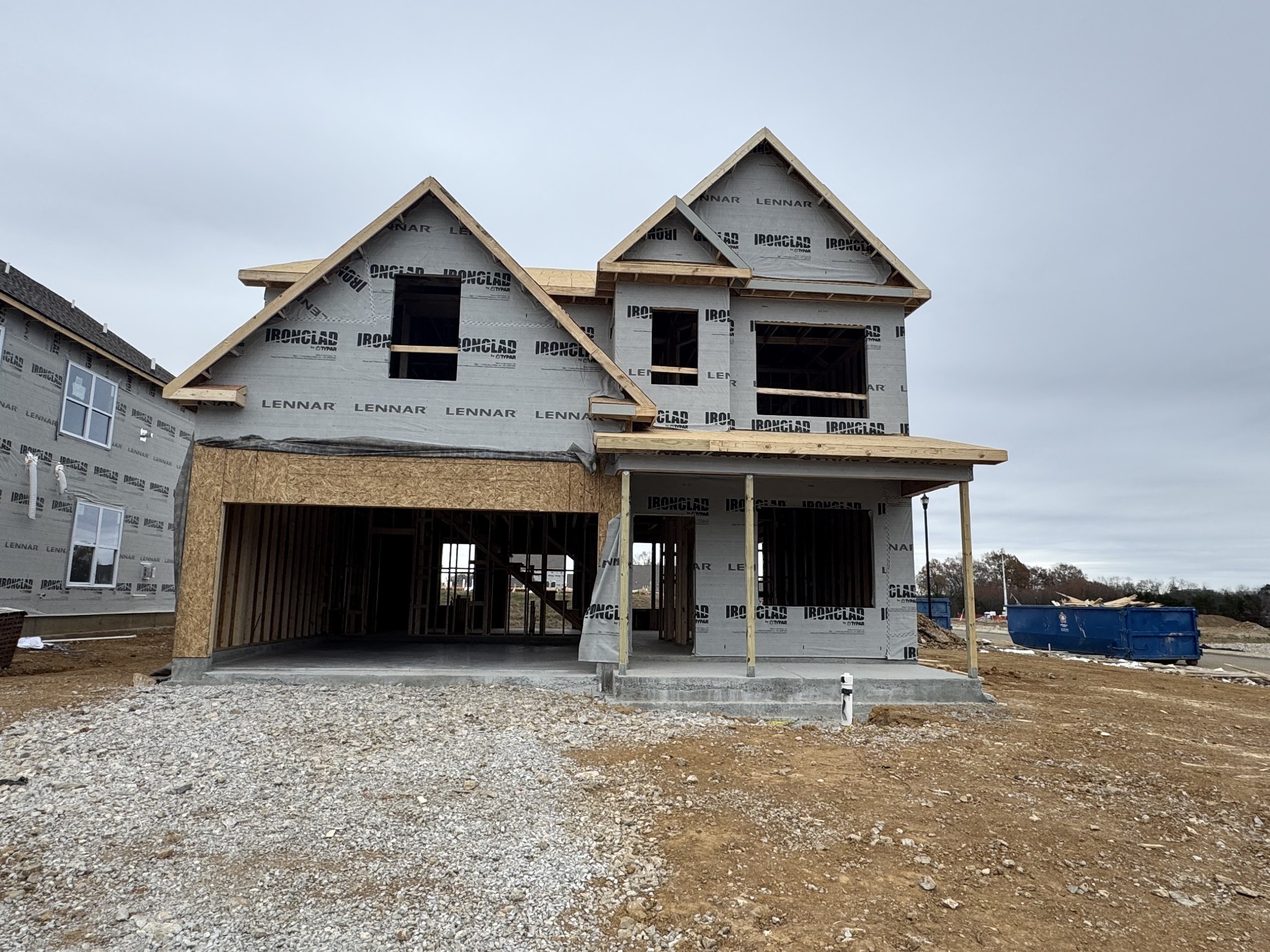 a view of a house with a yard and a fireplace