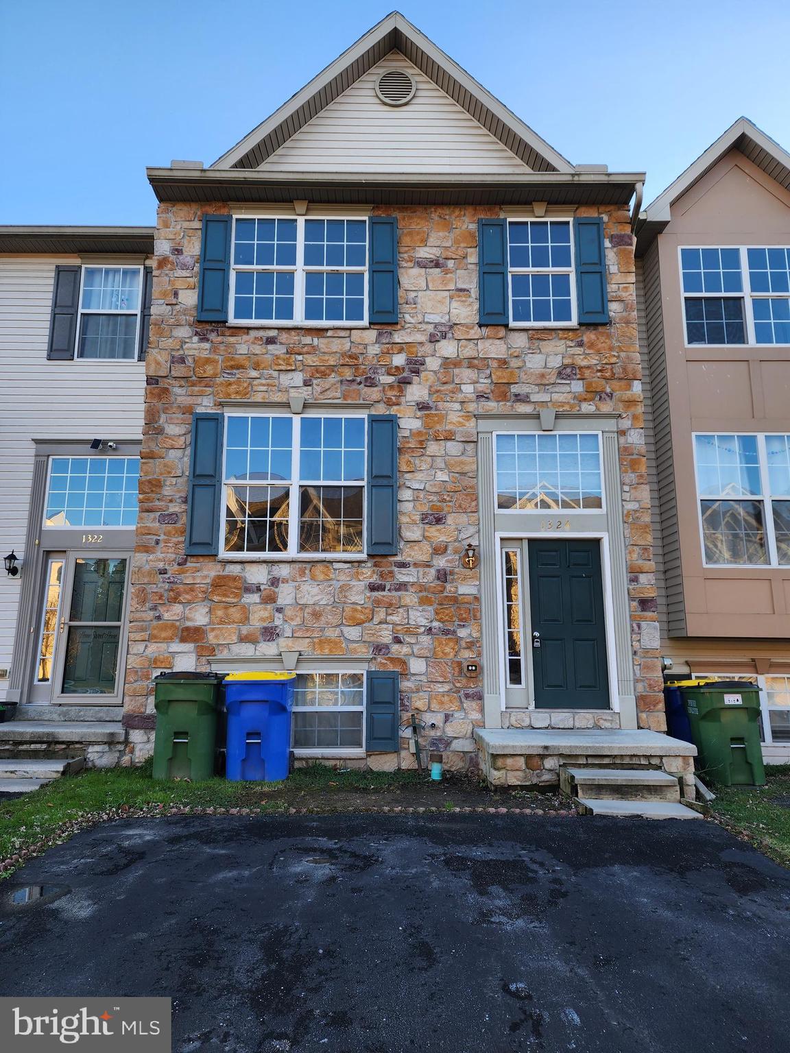 a front view of a house with yard