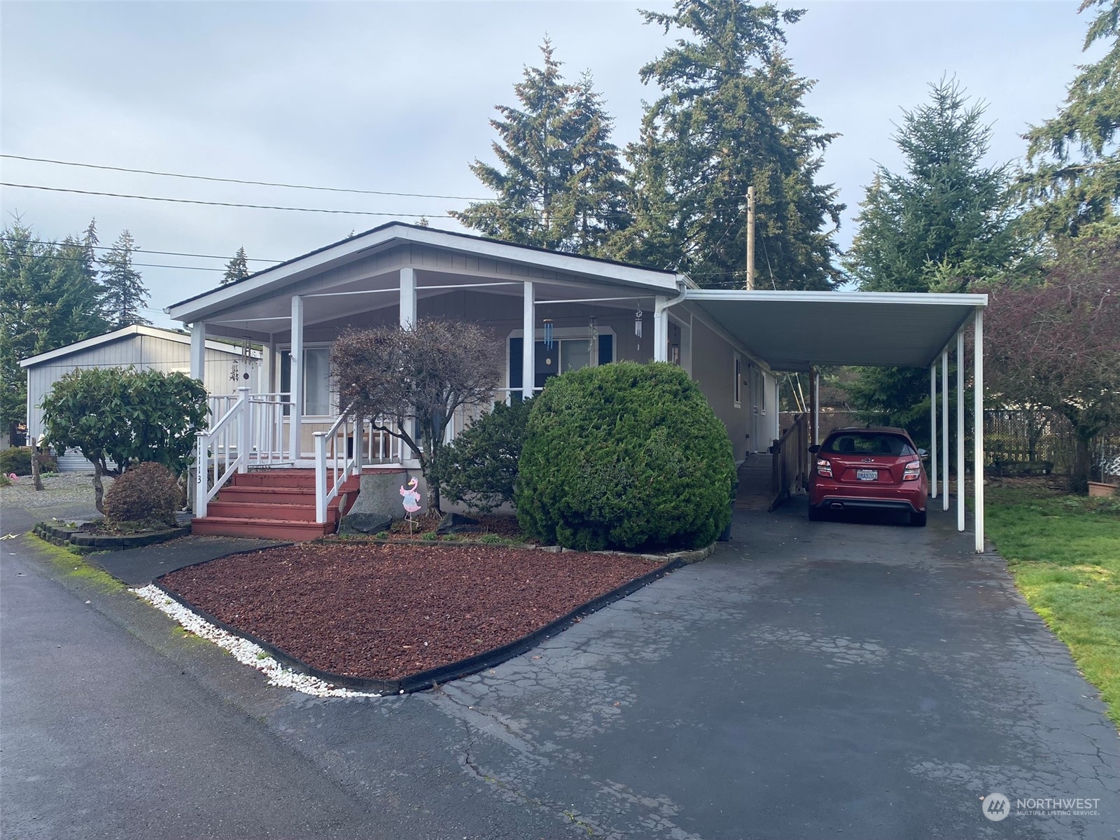 a view of a car in front of house