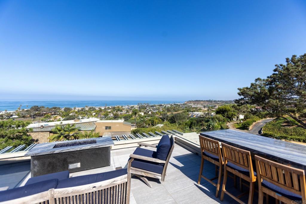 a view of a balcony with an ocean view