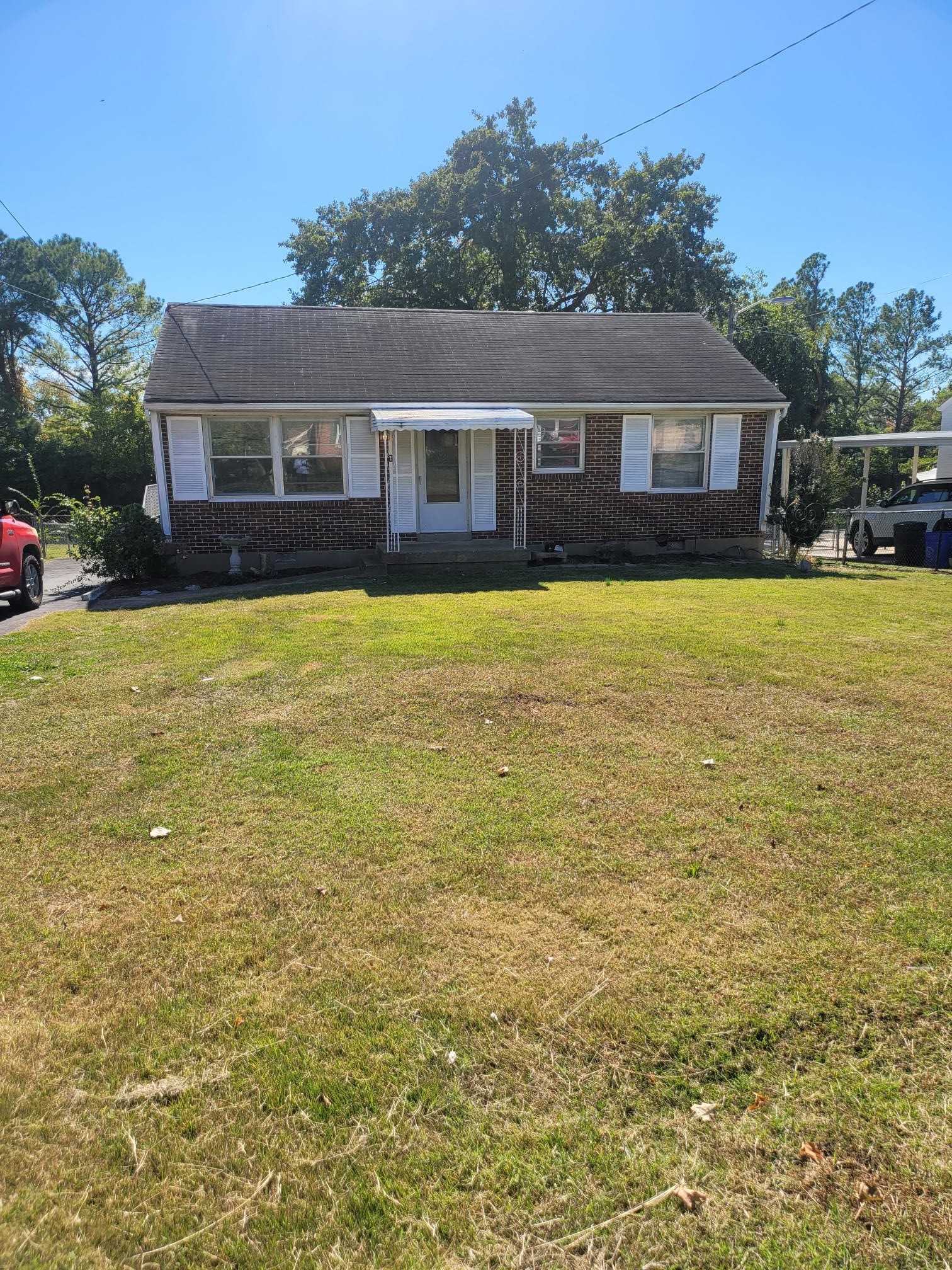 a front view of a house with swimming pool