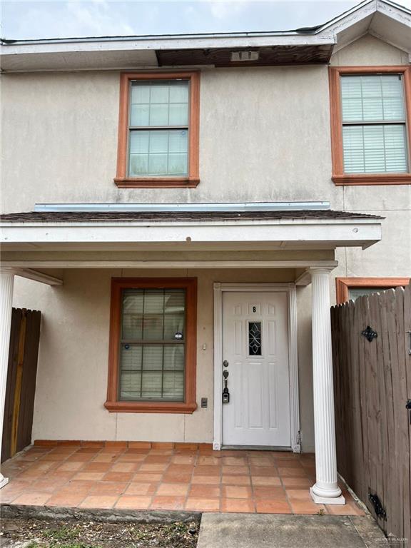 View of exterior entry featuring a porch