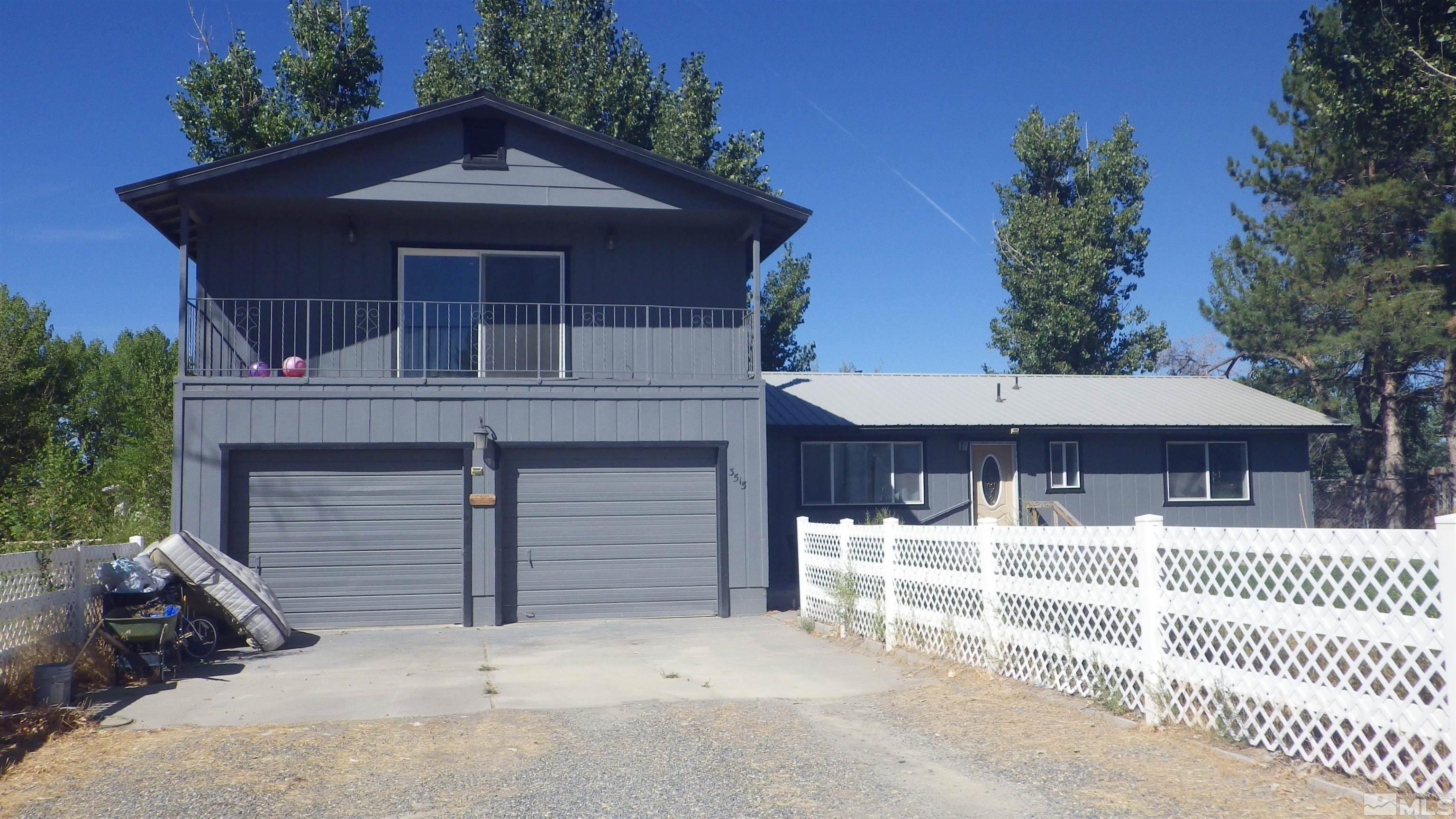 front view of a house with a garage