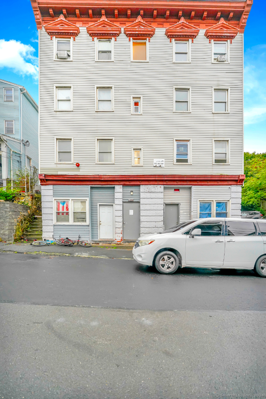 a car parked in front of a building